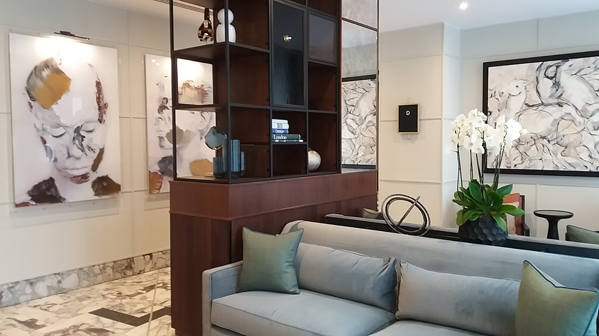 Sophie Derrick’s self-portraits (left) hang near work by Heidi Lanino (USA), one of several pieces in the residence with a horse theme. (‘Cheval’ is French for horse.)