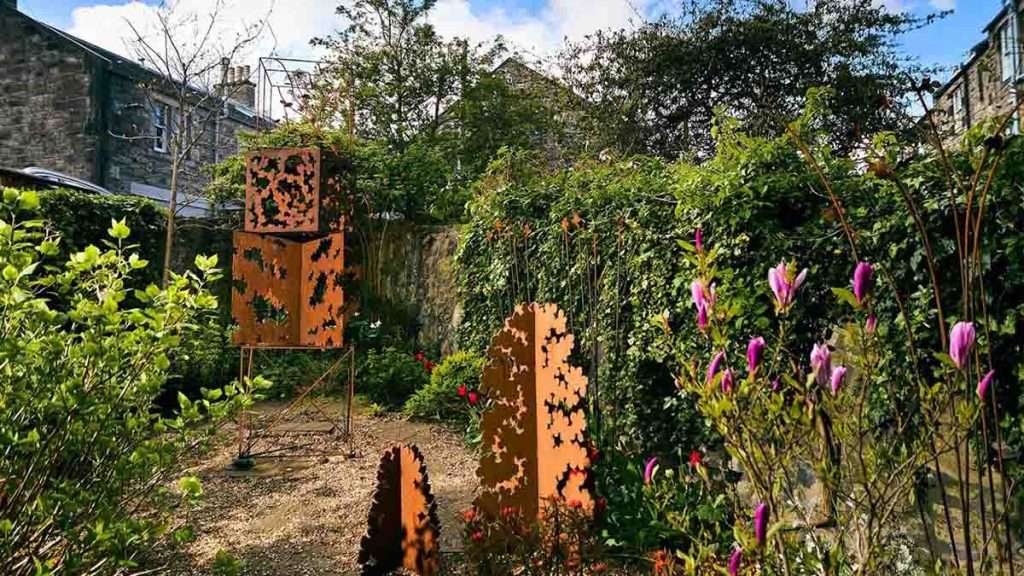 Andrea Geile, 'In the Gloaming' (rear) and other trees, corten steel, industrial steel