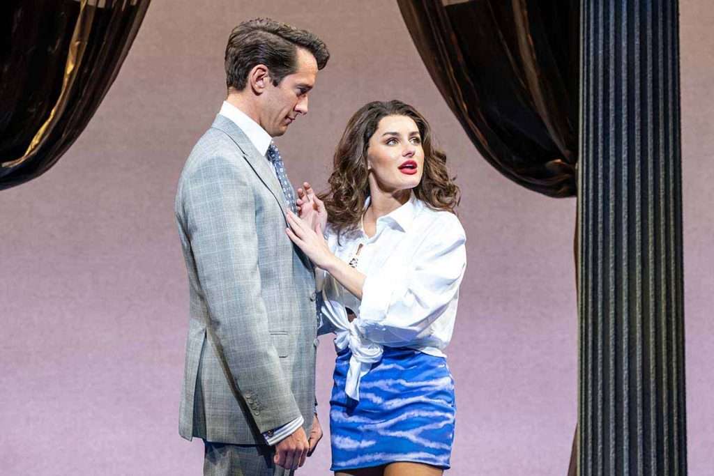 Oliver Savile as Edward Lewis with Amber Davies as Vivian Ward. Photo Marc Brenner