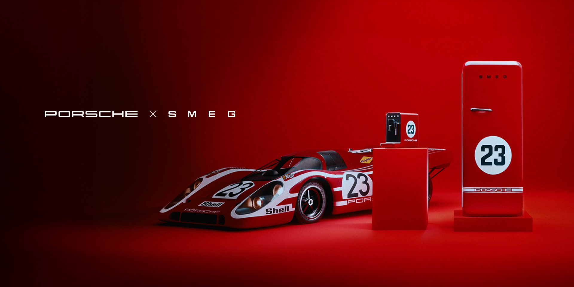 A visually striking composition set against a bold red background. At the center is a Porsche 917 KH race car, showcased in its iconic Salzburg livery, featuring a vivid red body with white racing stripes and sponsor decals. To the left of the car stands a red FAB refrigerator, and to the right, a Smeg Bean to Cup espresso machine. Both appliances are fully customized with design elements from the Porsche 917 KH Salzburg livery, creating a cohesive and motorsport-inspired aesthetic.